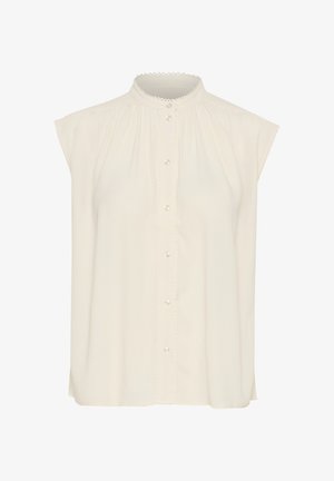 Kreemi värvi ilma varrukateta särk, millel on nööbid ees, laineline krae ja peene plisseeringu detail kogu bodice'i ulatuses.