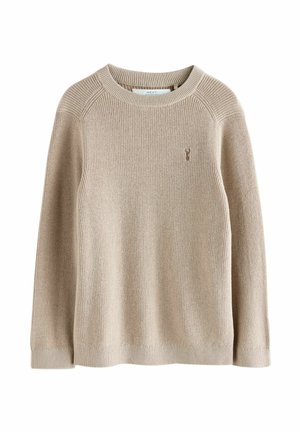 Maglione beige in maglia con scollatura rotonda a coste, maniche a raglan e un piccolo logo ricamato sul petto. Tessuto morbido e dalla texture interessante.