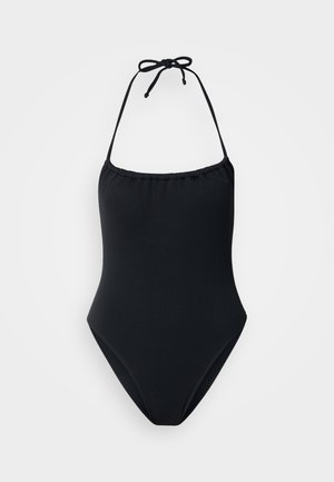 Costume intero nero con design a trama, laccetti al collo all'americana e gambe con taglio moderato. Tessuto liscio con silhouette aderente.