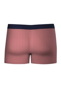 Boxer shorts rouges avec un motif blanc ondulé, dotés d'une taille unie marine. Fabriqués en tissu lisse et extensible pour le confort.