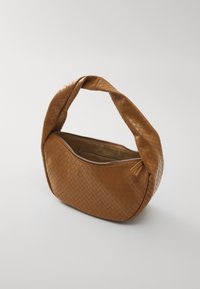 Brown woven leather shoulder bag with padded twisted strap and zipper opening showing interior pocket against a plain background.
