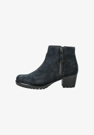 Black suede ankle boot with a rounded toe, side zipper, and block heel. Features a textured sole for grip and stability.