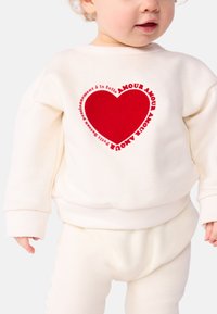 Petit Bateau BÉBÉ MOLLETON - Melegítőfelső - milk