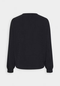 Czarna bluzka z długim rękawem, o teksturowanej tkaninie, z okrągłym dekoltem i mankietami zapinanymi na guziki. Tył ma prosty, minimalistyczny design.