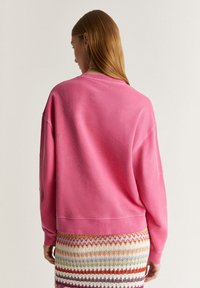 Scalpers Sweatshirt - fucsia