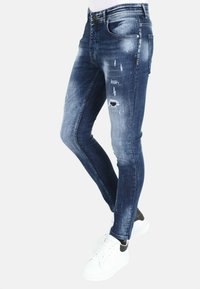 Local Fanatic PAINT SPLATTER GATEN - Slim fit jeans - blauw