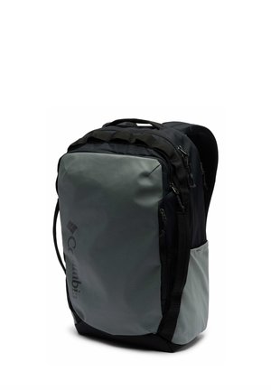 Sac à dos Columbia noir et gris avec plusieurs compartiments zippés et bretelles rembourrées.