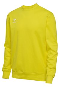 Geel sweatshirt gemaakt van zachte stof, met een ronde hals, lange mouwen, geribde manchetten en een klein wit logo op de borst.