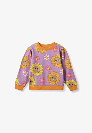 Svetlo siv pulover z oranžnim ovratnikom in manšetami, ki se ponaša z igrivim vzorcem sončnic in cvetlic s smešnim obrazom.