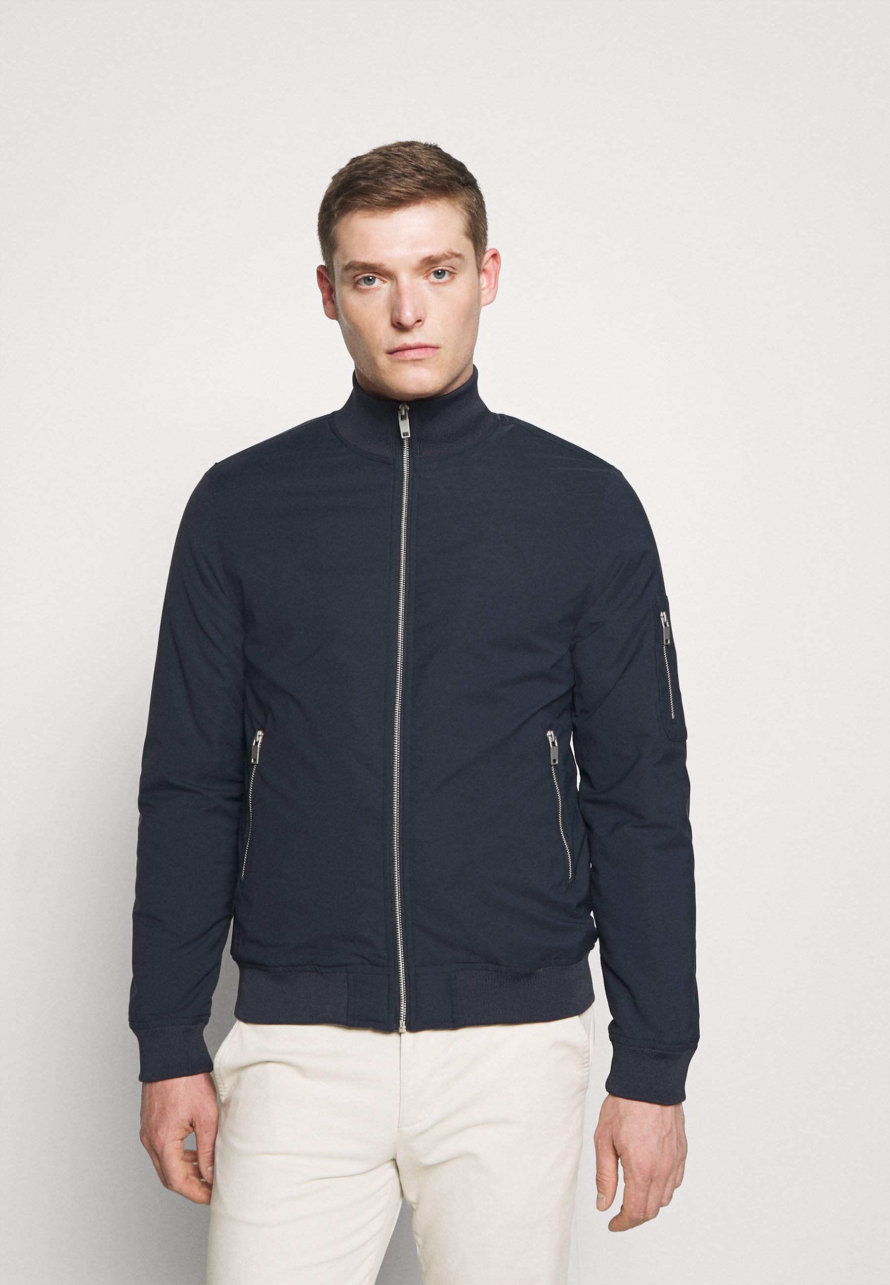 navy padded bomber jacket