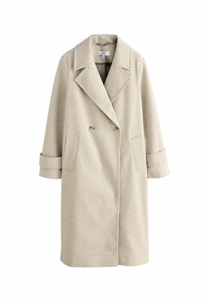 Beige double-breasted lange jas met brede revers, twee knopen, opgestikte zakken en mouwen met bandjes, tegen een witte achtergrond.