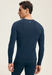 Henderson - Podkoszulki