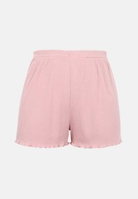 Short en maille côtelée rose clair avec taille élastique et ourlets légèrement froncés aux deux jambes sur fond blanc.