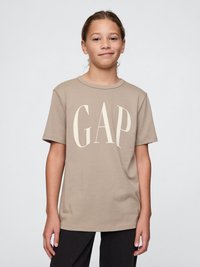 Hnědé tričko s krátkým rukávem s přehnaným bílým logem "GAP". Měkká, bavlněná tkanina s volným střihem. V kombinaci s tmavými kalhotami.