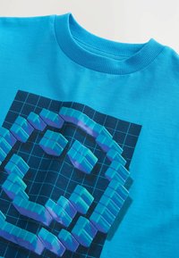 Unselected, blue pixel smile