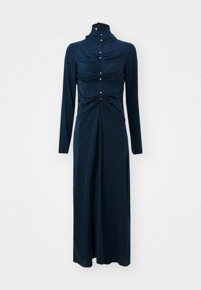Long-sleeve, dark navy dress with a high collar, ruched front detailing, and decorative button accents along the bodice and neck.
