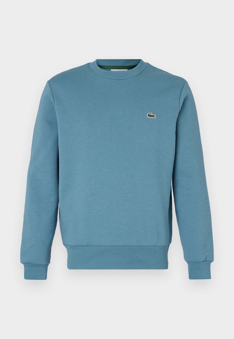 Lacoste UNISEX Sweatshirt limestone/blau Zalando