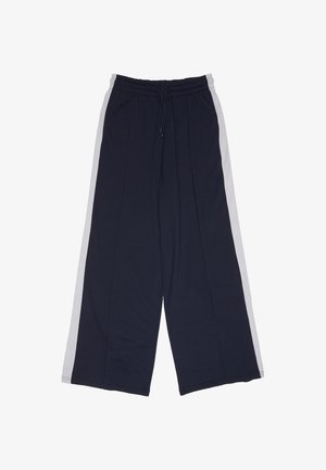 Donkerblauwe sweatpants met wijde pijpen, witte zijstrepen en een elastische tailleband met trekkoord.