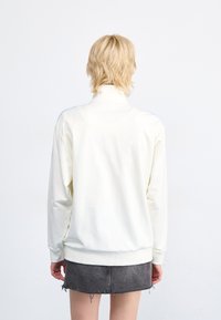 adidas Originals BLOCKED - Vetoketjullinen college - off white