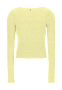 Pitkähihainen paita pehmeästä, teksturoidusta keltaisesta kankaasta. Pyöreä kaula-aukko ja vartalonmyötäinen leikkaus. Hihansuiden saumat ovat viimeistelemättömät.