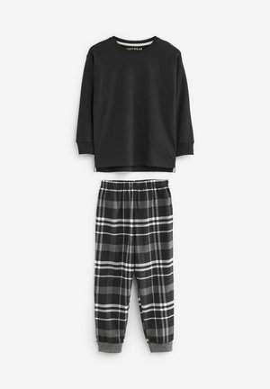 Black long-sleeve shirt with ribbed neckline, paired with black and gray plaid pajama pants featuring an elastic waistband and grey cuffs.