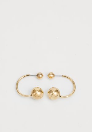Gold-tone metal earrings featuring a circular design with two spheres, one larger and textured, and a smaller polished ball at the top.