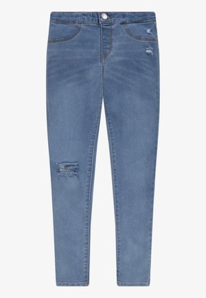 Jeans skinny de denim azul con una cintura de media altura, que presentan detalles desgastados en la parte frontal y un diseño clásico de cinco bolsillos.