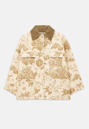 Beige jakke med blomstermønster og cord fløjlskrave, der har fire frontlommer og en afslappet pasform. Struktureret stof med botaniske designs.