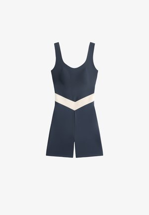Maillot de bain bleu marine au design ajusté, avec de larges bretelles et une bande contrastante de couleur claire autour de la taille. Texture lisse.