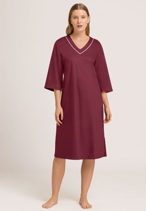 Burgundy sleep dress with a V-neckline, short wide sleeves, side slits, and contrasting white stitching along the neckline and hem.