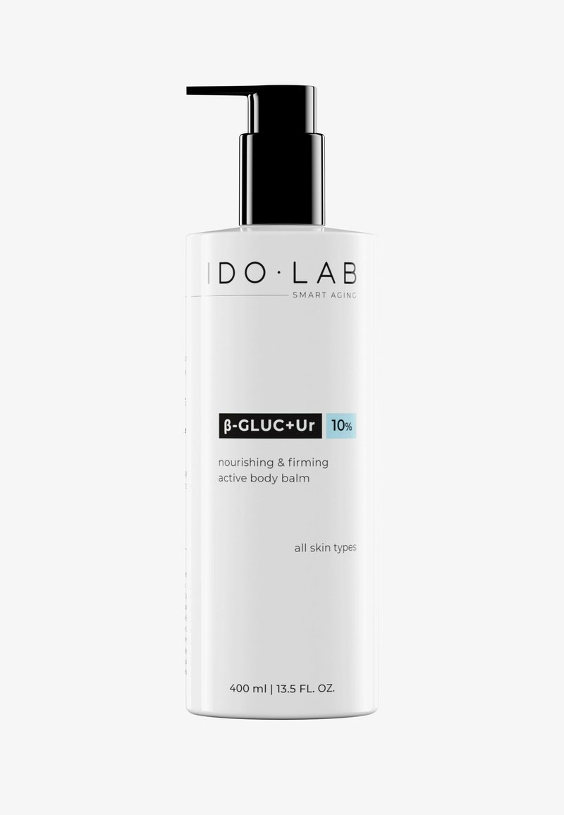 White cylindrical bottle with a black pump, labeled "IDOLAB SMART AGING," featuring bold text and blue accents, containing 400 ml of body balm.