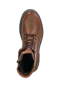 Bruine leren veterschoenen met een ronde neus, gewatteerde kraag en een ritssluiting. Fleecevoering zichtbaar aan de bovenkant en een gestructureerde rubberen zool.
