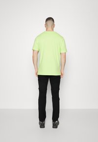 Mammut ZINAL HYBRID ZIP OFF PANTS - Trousers - black