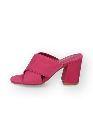 Open-toe pink suede heeled sandals with a wide, crossed strap design. Square heel and smooth texture, featuring a solid color without patterns.