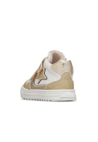 Vita och guld sneakers med glittriga accenter, stjärndesign och kardborreband. Texturerad sula och vadderat ankelskydd.