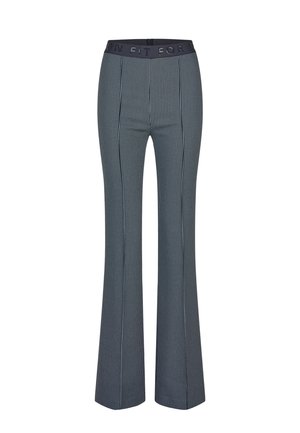 Navyblaue und weiße Hosen mit Hahnentritt-Muster, ausgestelltem Schnitt und schwarzem elastischem Bund mit geprägtem Text.