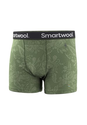 Oliwkowo-zielone bokserki z kwiatowym wzorem, czarny pas z białym logo „Smartwool” oraz mała wielokolorowa metka przy krawędzi.