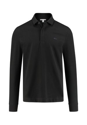 Polo shirt noir à manches longues en coton avec un col classique, arborant un logo noir brodé discret sur la poitrine gauche.