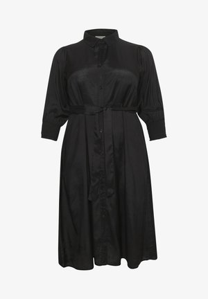 Black shirt dress in silky material, featuring a button-down front, collar, three-quarter sleeves, and a belted waist with smocked cuffs.