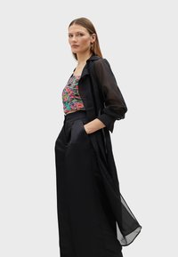 LOLA CASADEMUNT Kišni ogrtač - black
