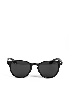 Black sunglasses with a cat-eye shape, dark lenses, and silver rivets on the frames. Smooth texture with a glossy finish.