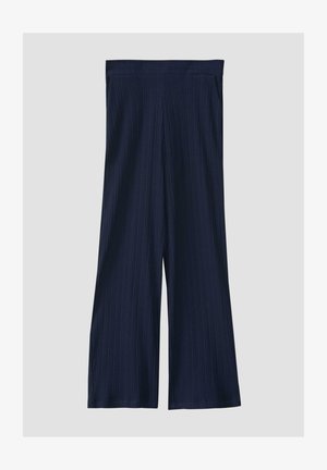 Marineblauwe weite Hose mit vertikaler Rippstruktur und elastischem Bund, die einen lockeren Schnitt aufweisen und keine sichtbaren Beschläge oder Akzente haben.