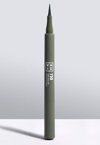 Grønn eyelinerpenne med fin spiss, matt finish, og hvit tekst som merker merkevaren og produktet. Elegant sylinderformet design.