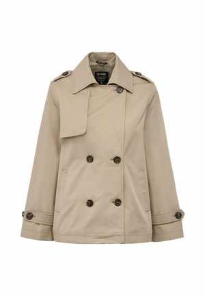 Beżowy trencz z podwójnym zapięciem, dużymi guzikami, szerokim kołnierzem, bocznymi kieszeniami i podwiniętymi rękawami. Wykonany z lekkiego materiału.