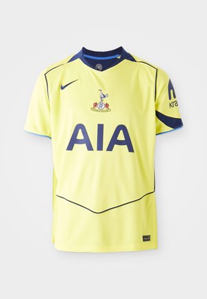 Gelbes Fußballtrikot mit navyblauen Akzenten. Enthält das Vereinslogo auf der Brust und "AIA" in großen, dunklen Buchstaben gedruckt. Kurze Ärmel.