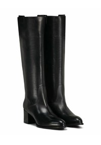 Bottes en cuir noires, montant jusqu'aux genoux, avec des talons blocs et des orteils ronds, présentées côte à côte sur un fond blanc.