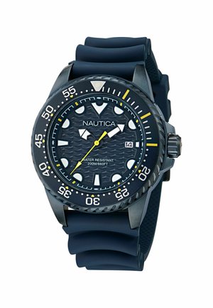 Nautica dive watch with black silicone strap, textured black dial, white hour markers, yellow accents, and a rotating bezel marked for time.