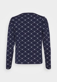 Camisola de manga longa azul-marinho com um padrão de diamante repetido, apresentando âncoras e pontos brancos, feita de um tecido liso e elástico.