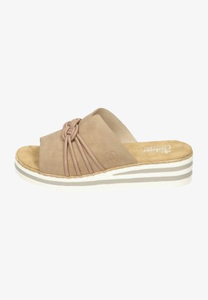 Light brown suede slide sandal with braided strap design and cushioned insole. Features a layered white and gray sole for stability.