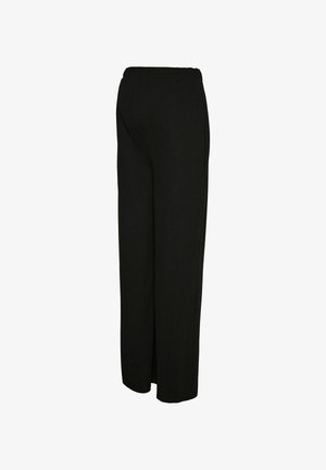 Pantalons noirs avec une coupe large, taille élastique et tissu doux, vus de côté avec une coupe droite et sans ornements visibles.
